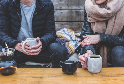 Two people sharing coffee