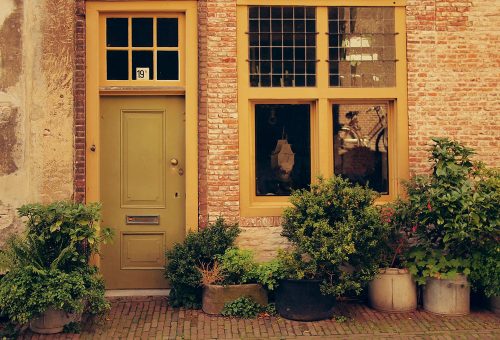 Front door of house on street