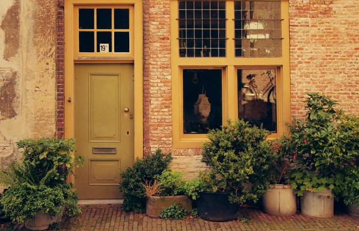 Front door of house on street
