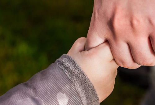 Two hands holding