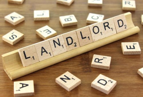 Landlord spelt out using scrabble letters