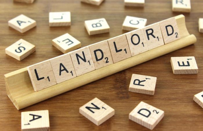Landlord spelt out using scrabble letters