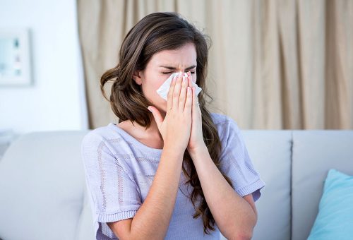Person sneezing