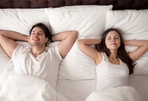 Two people on a mattress