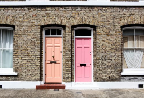 Two front doors on suburban street
