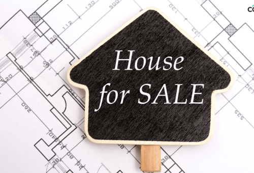 House for Sale sign graphic on a blueprint background