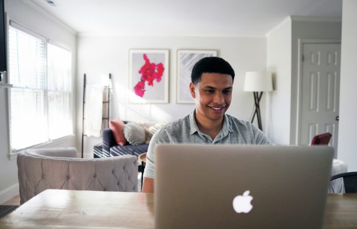 Man using a laptop at home