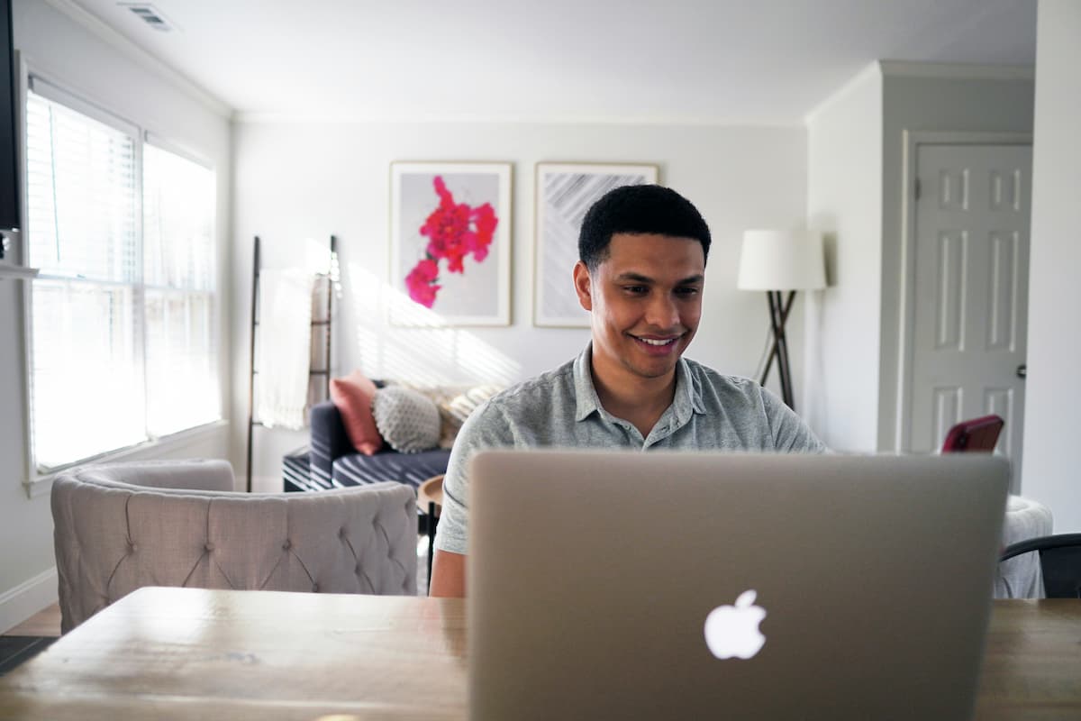 Man using a laptop at home