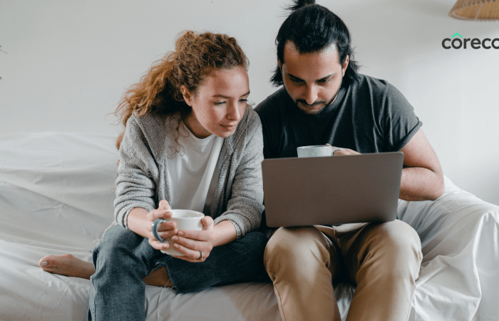 Couple looking at a laptop together