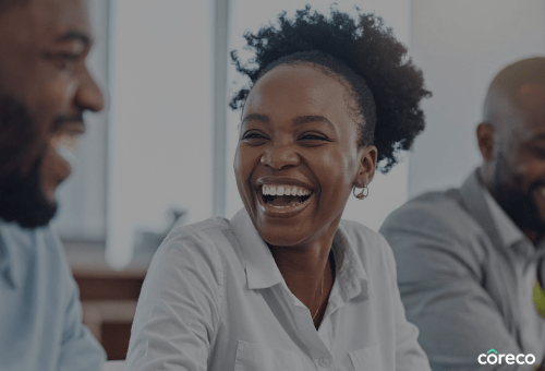 Smiling woman in a group discussion