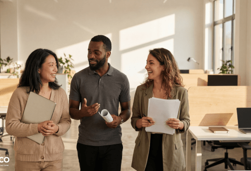 Colleagues chatting together in an office